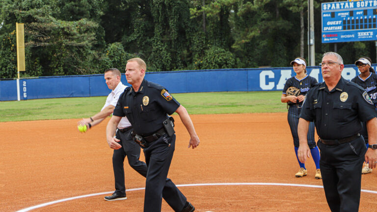 Smyrna first responders throw out ceremonial first pitch at Campbell softball game